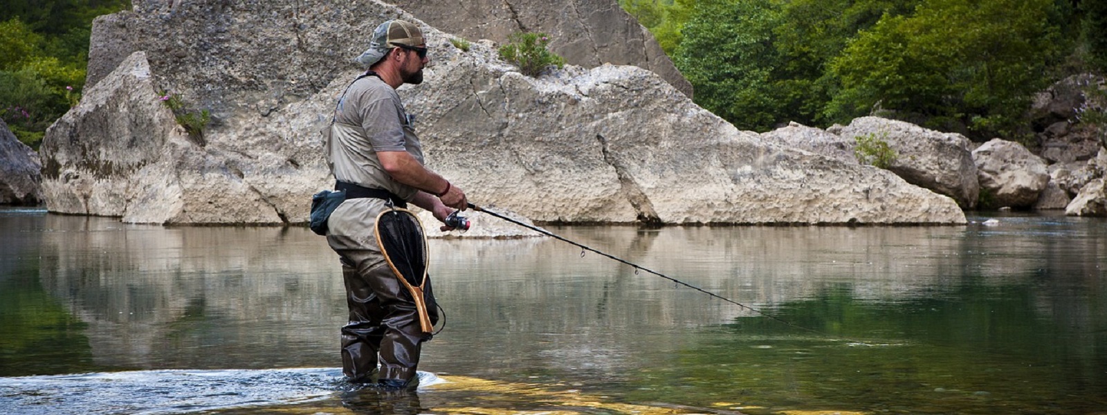 Pêcheur à échassiers